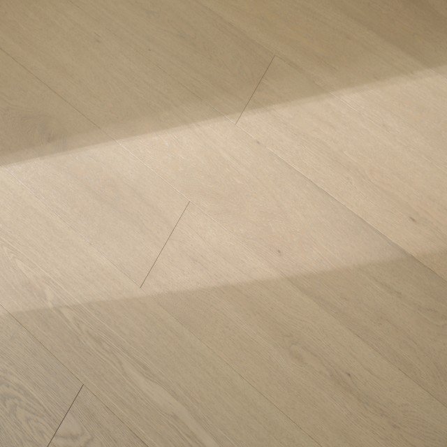 Capri Select grade Oak hardwood flooring with Brushed surface - 7.5" wide planks installed in Houston home interior