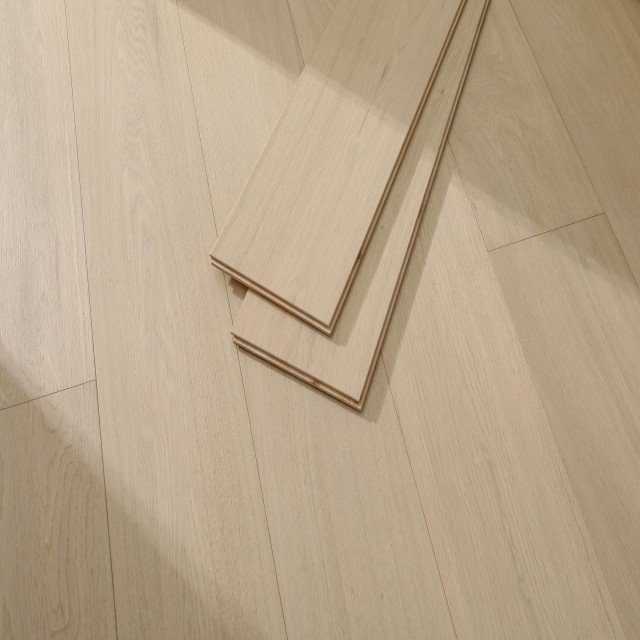 Sorrento Select grade Oak hardwood flooring with Brushed surface - 7.5" wide planks installed in Houston home interior